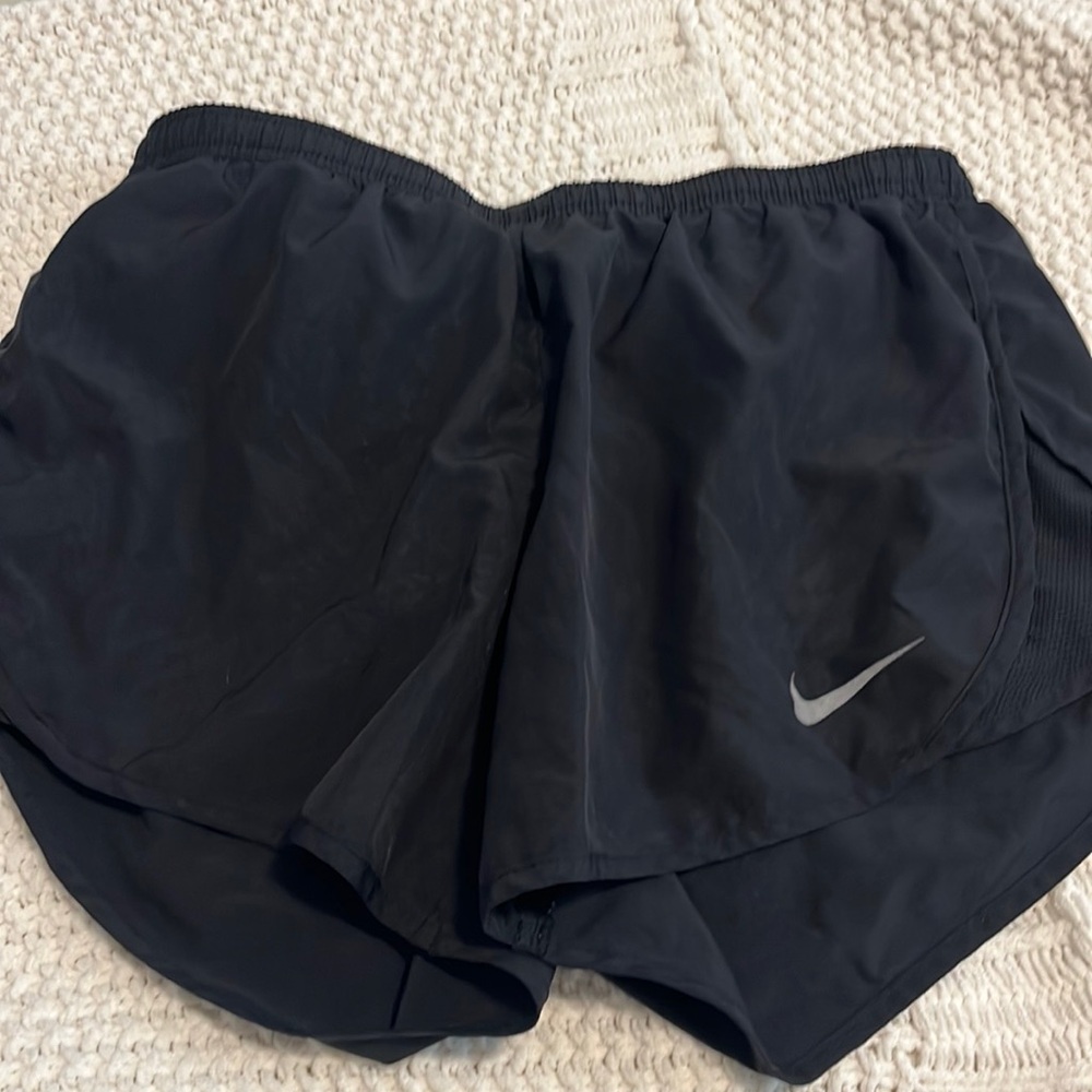 Black Nike running shorts